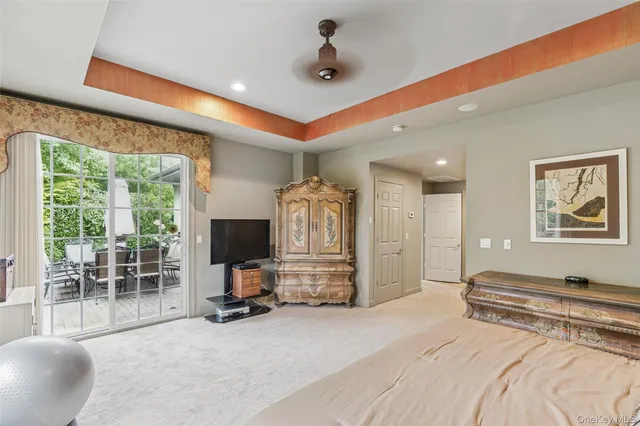 a bedroom with furniture and a window