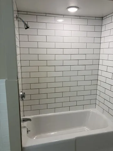 a bathroom with a bathtub