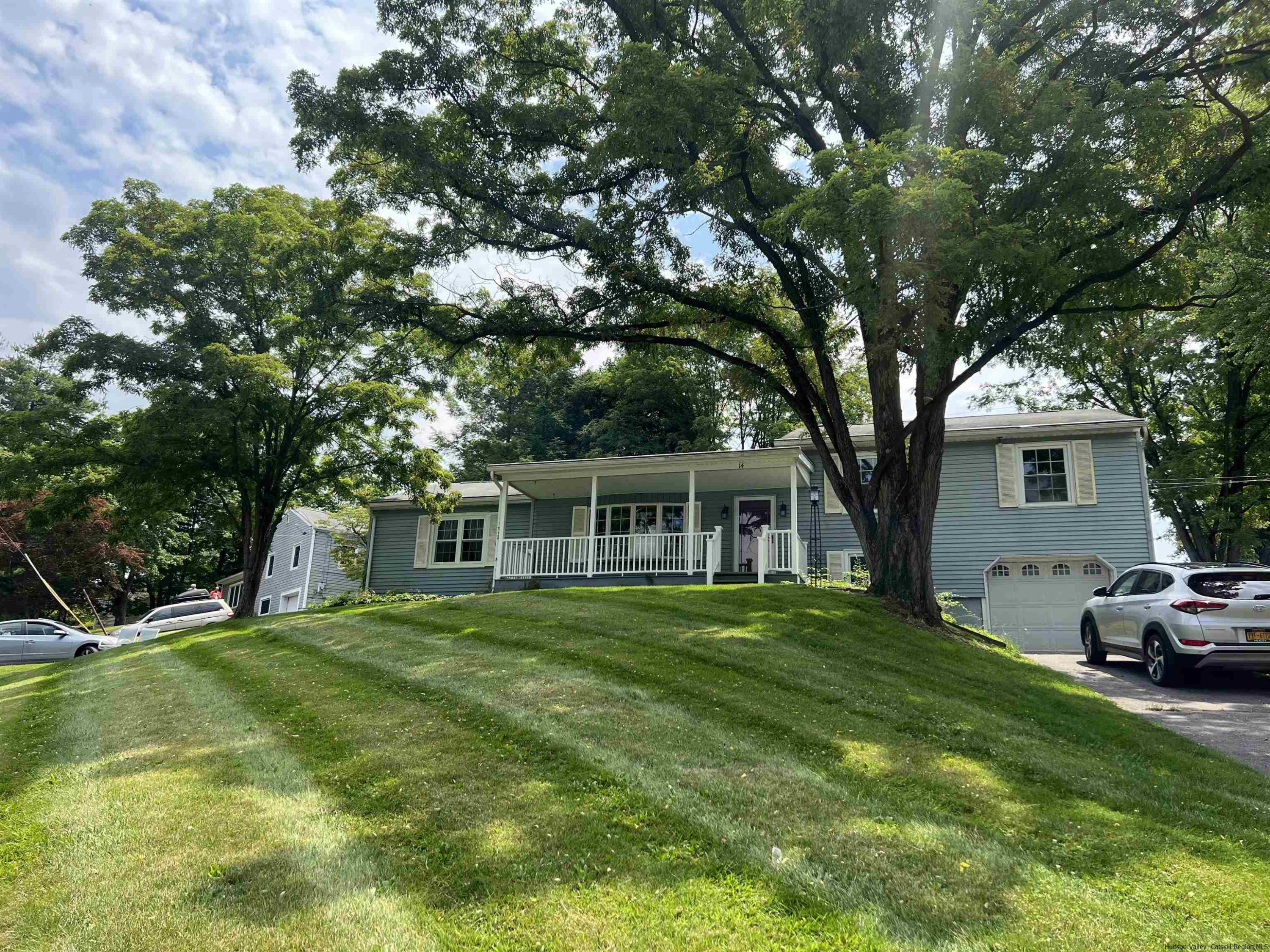 14 Brian Road Poughkeepsie, NY 12601 - Photo 1 of 20 a front view of house with yard and green space