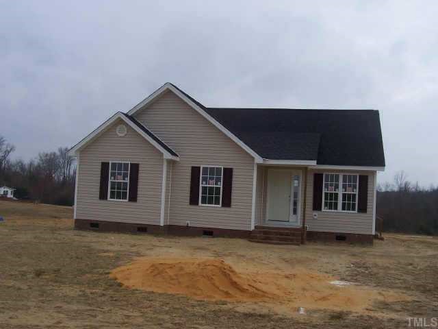 1553 Live Oak Road Coats, NC 27521 - Photo 1 of 1 front view of a house with a yard