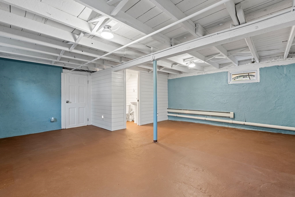 46 Gannett Road Quincy, MA 02169 - Photo 18 of 26 a view of a room with wooden walls