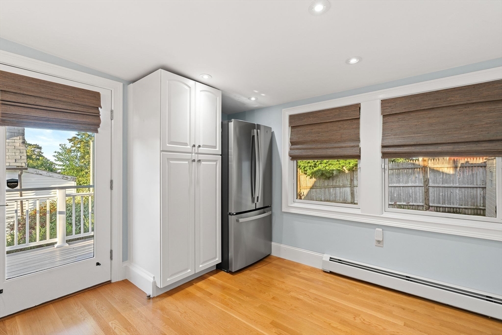 46 Gannett Road Quincy, MA 02169 - Photo 8 of 26 a view of a livingroom with an empty space and a window