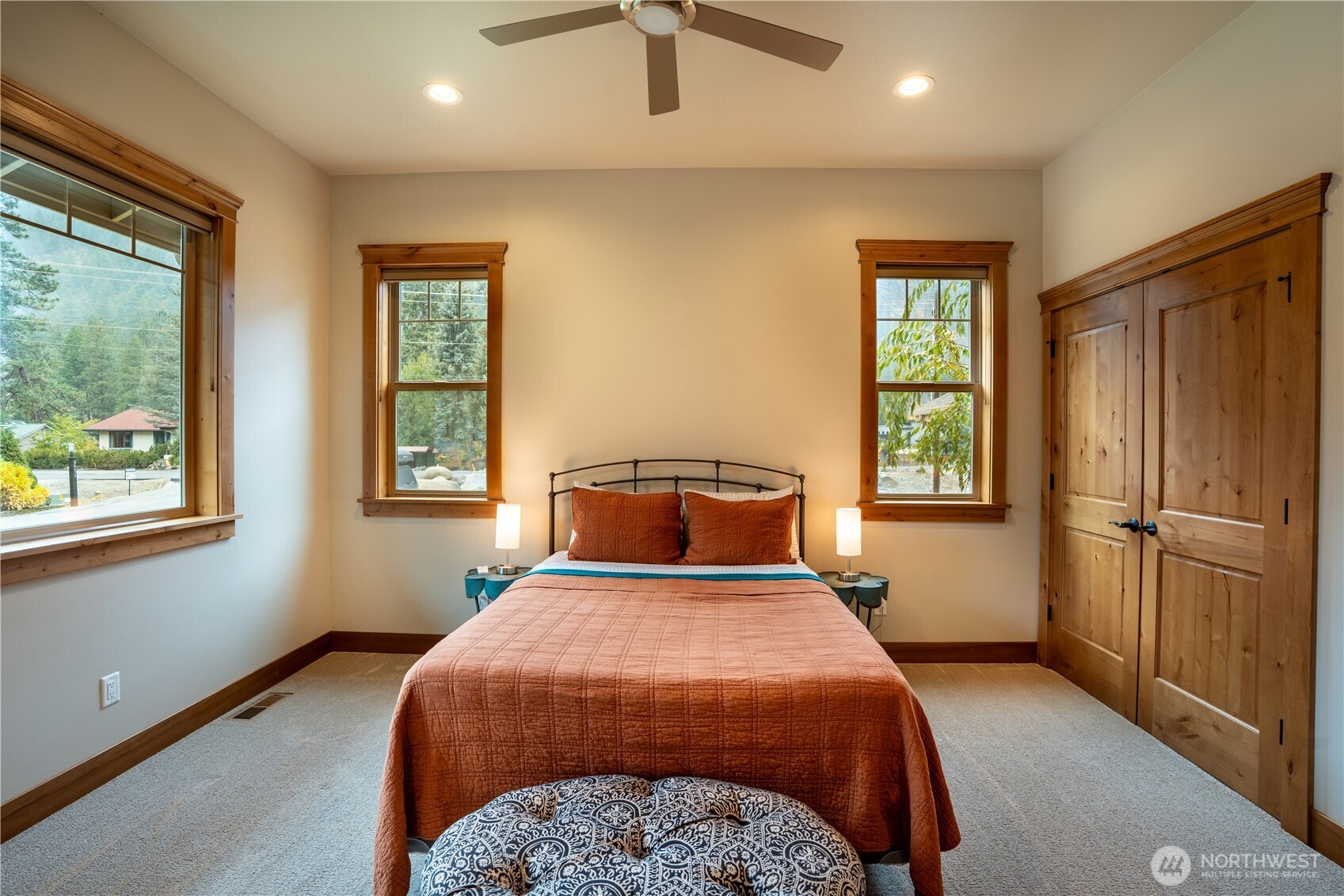 9047 Icicle Road Leavenworth, WA 98826 - Photo 17 of 30 a bedroom with a bed and a window