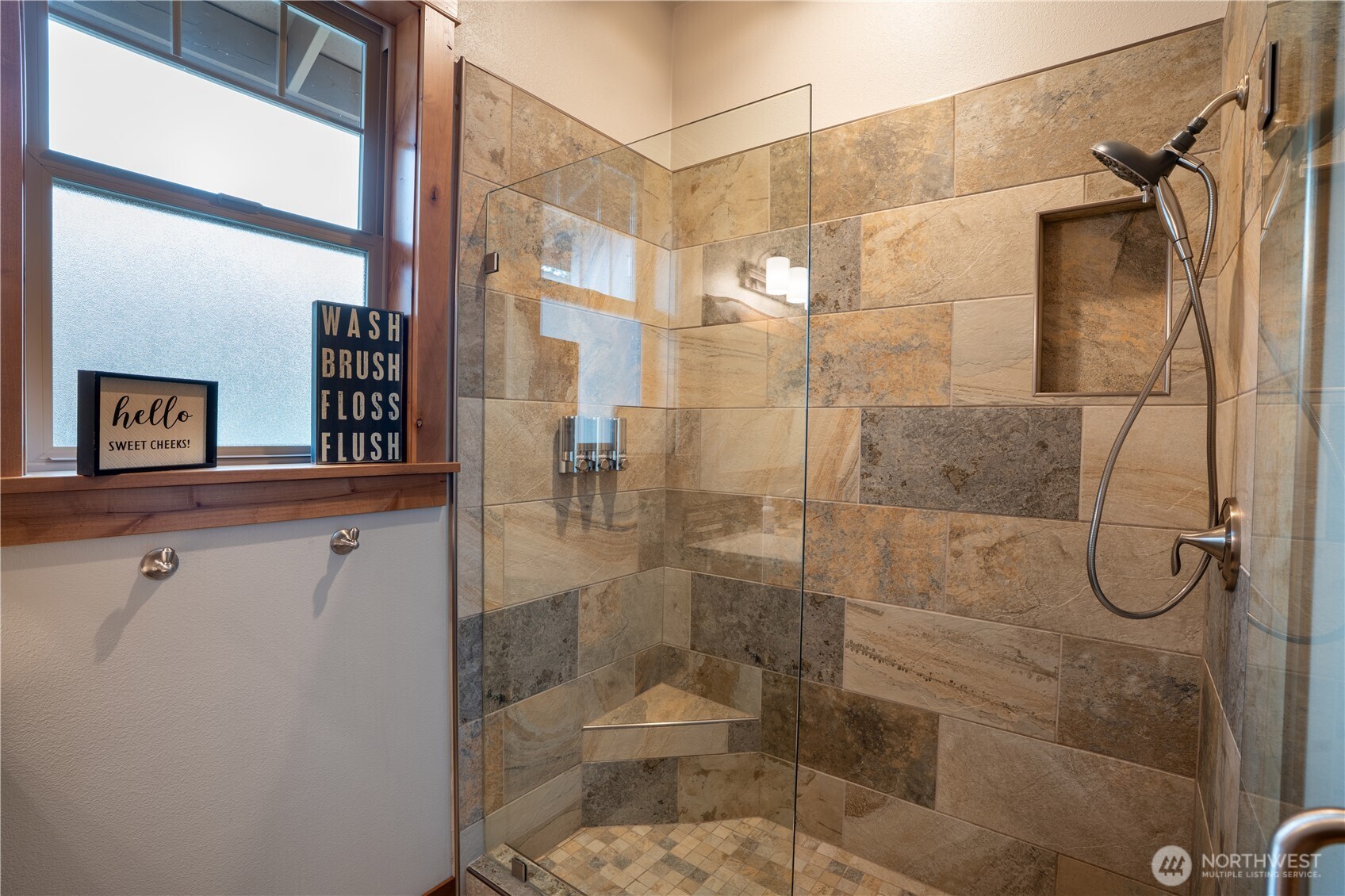 9047 Icicle Road Leavenworth, WA 98826 - Photo 19 of 30 a bathroom with a shower and toilet