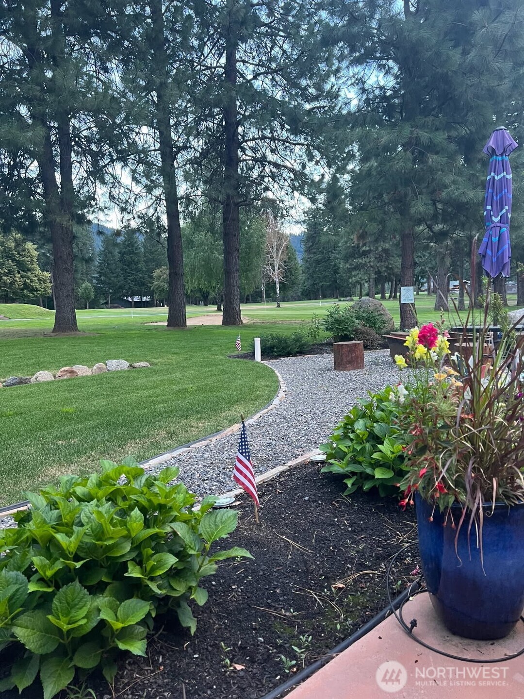 9047 Icicle Road Leavenworth, WA 98826 - Photo 28 of 30 a view of a garden with plants and trees