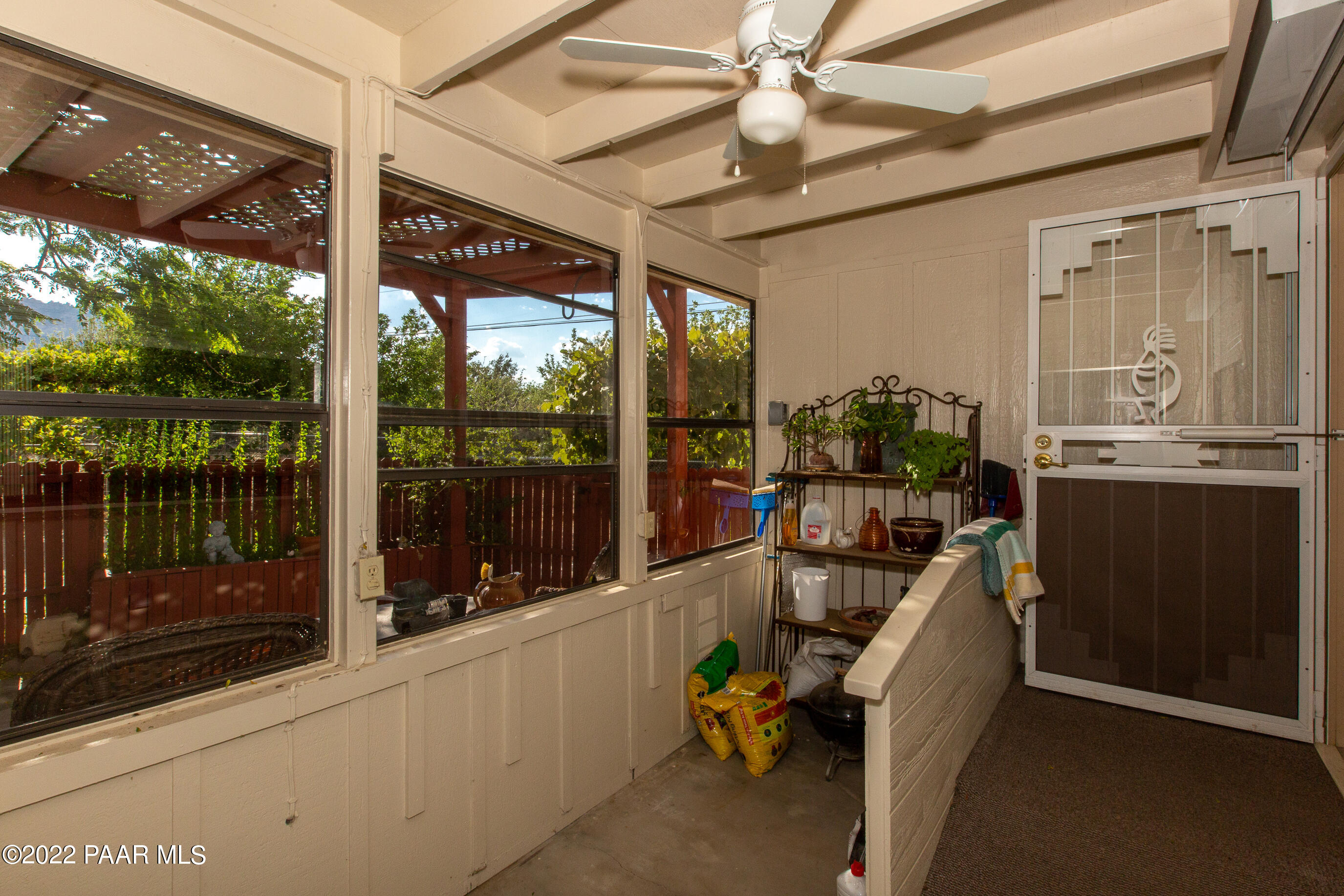 6050 North Williamson Valley Road Prescott, AZ 86305 - Photo 49 of 59 screened porch to covered patio