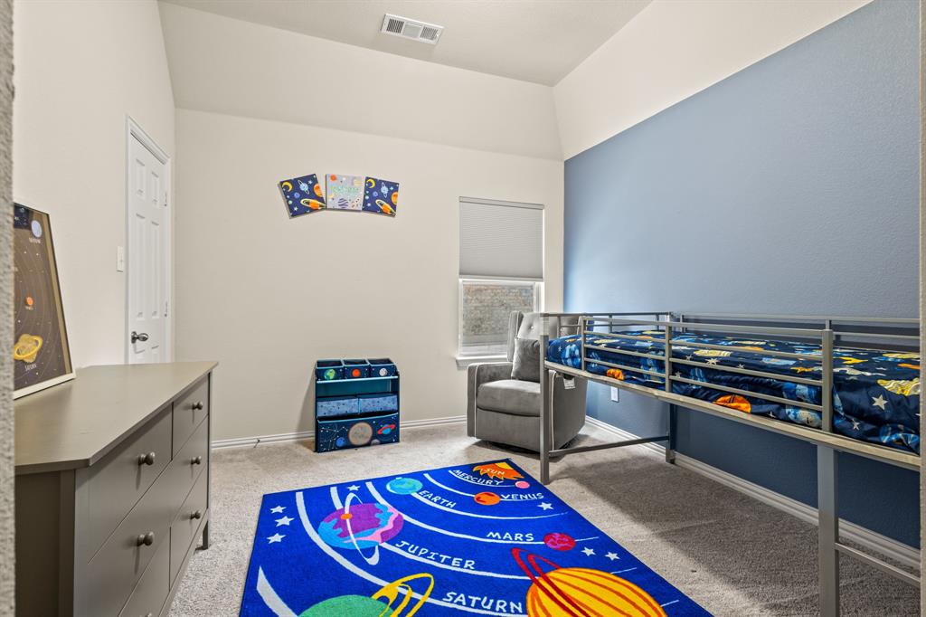 1036 Edgefield Lane Forney, TX 75126 - Photo 13 of 30 a room with furniture and a table