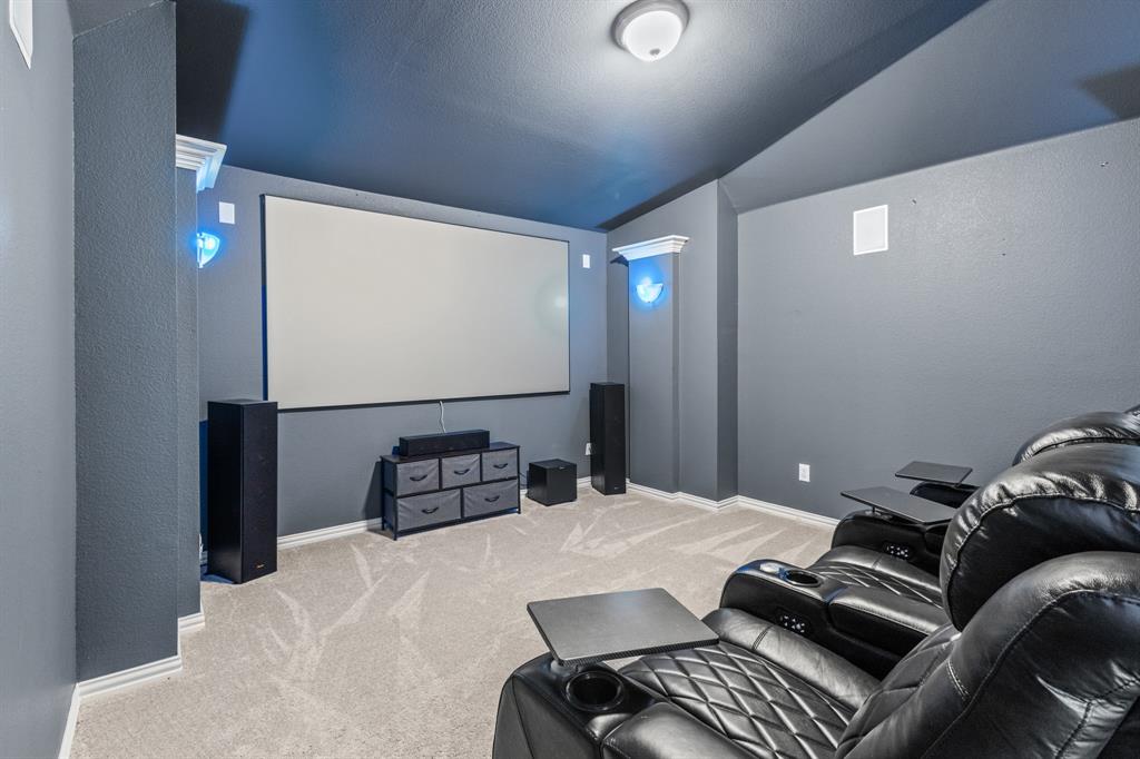 1036 Edgefield Lane Forney, TX 75126 - Photo 14 of 30 a bedroom with a bed and a couch