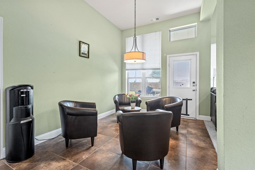 1036 Edgefield Lane Forney, TX 75126 - Photo 16 of 30 a living room with furniture and a window