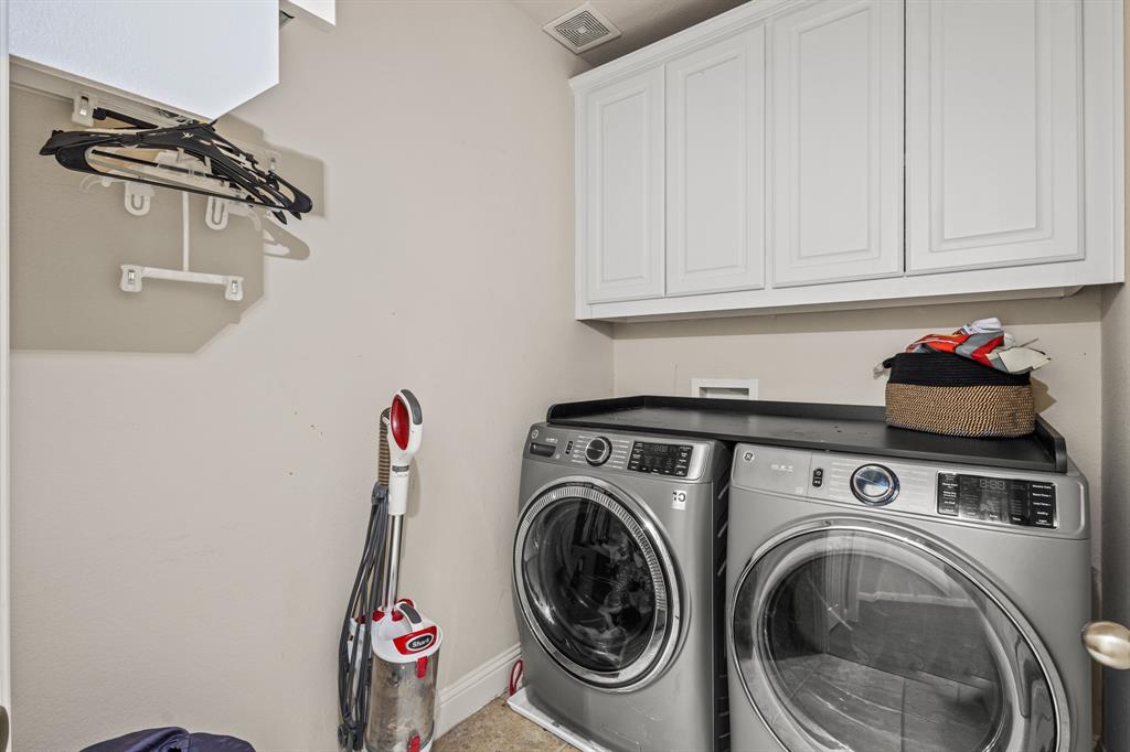 1036 Edgefield Lane Forney, TX 75126 - Photo 20 of 30 a utility room with dryer and washer