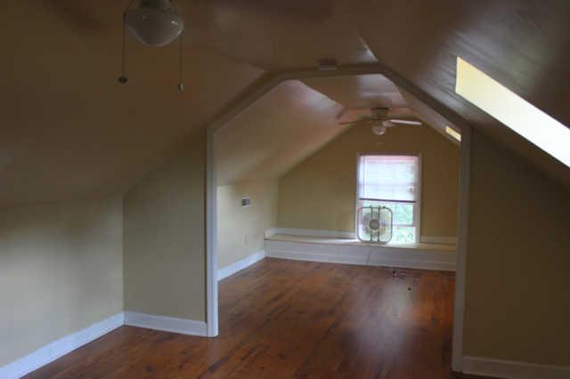 1490 Nails Creek Road Dickson, TN 37055 - Photo 11 of 11 an empty room with wooden floor and windows