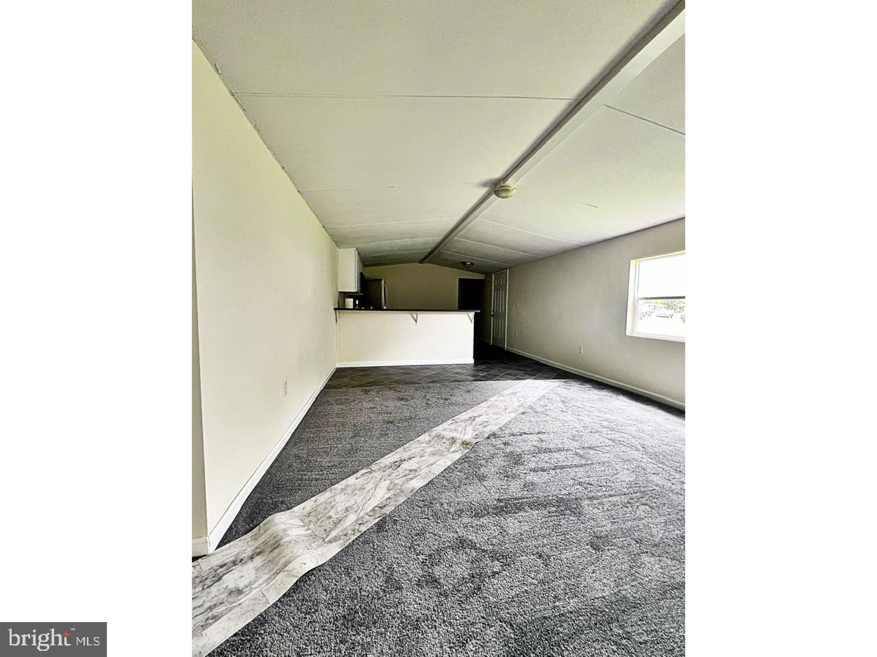 2189 Downs Chapel Road Clayton, DE 19938 - Photo 13 of 13 a view of a big room with windows