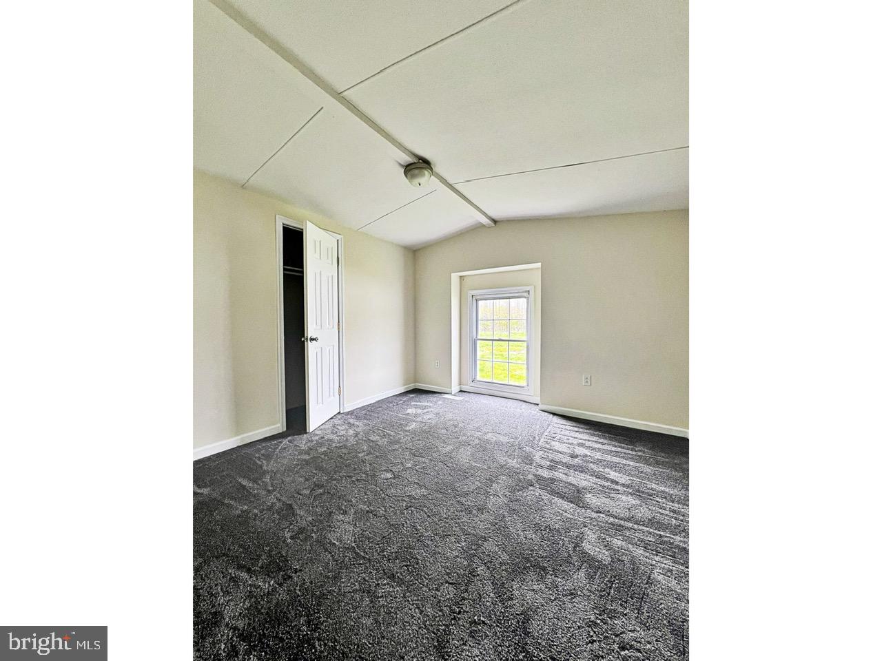 2189 Downs Chapel Road Clayton, DE 19938 - Photo 6 of 13 a view of livingroom and window