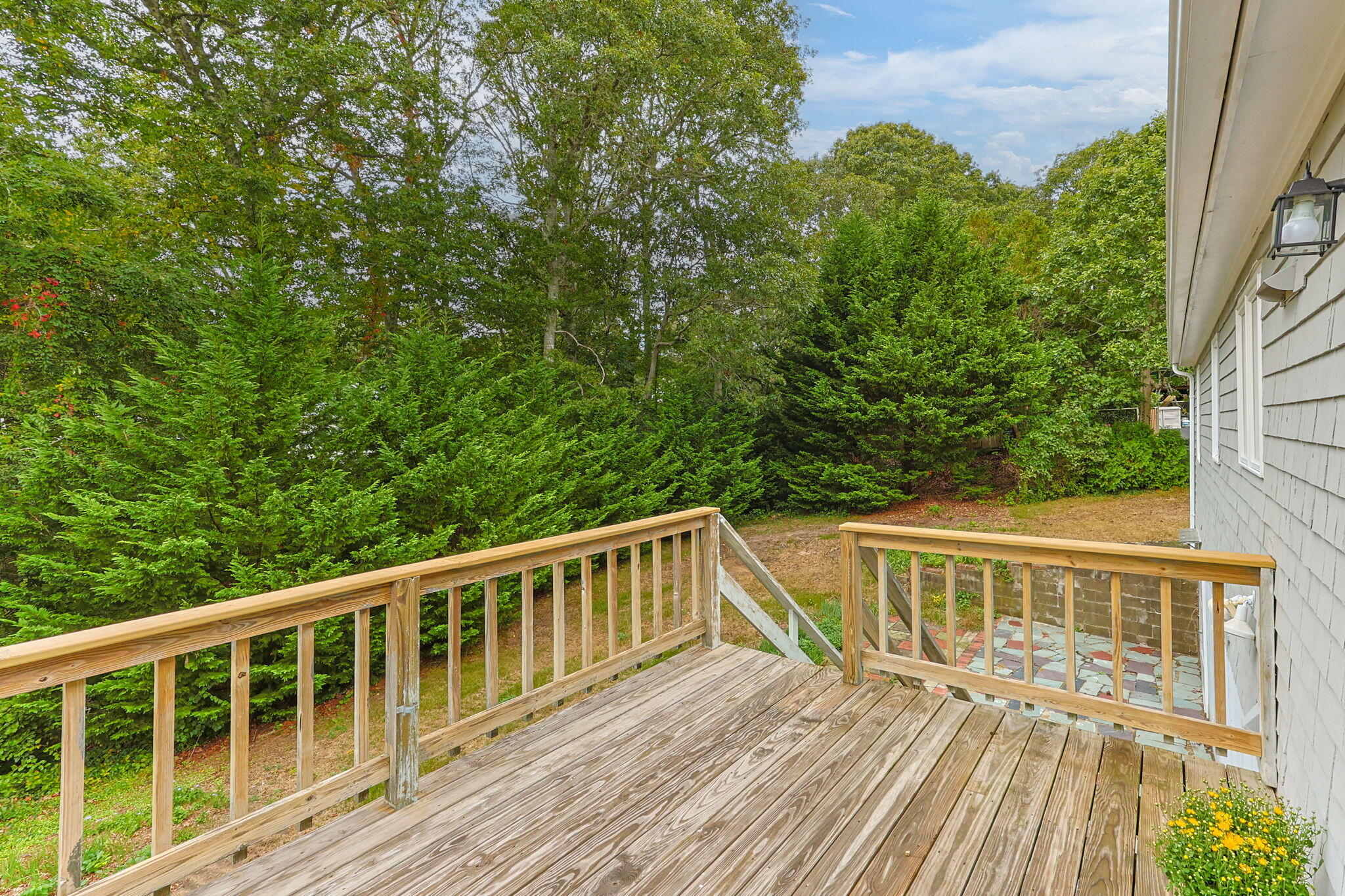 21 Green Way South Yarmouth, MA 02664 - Photo 32 of 42 a view of a wooden deck and a yard with wooden fence