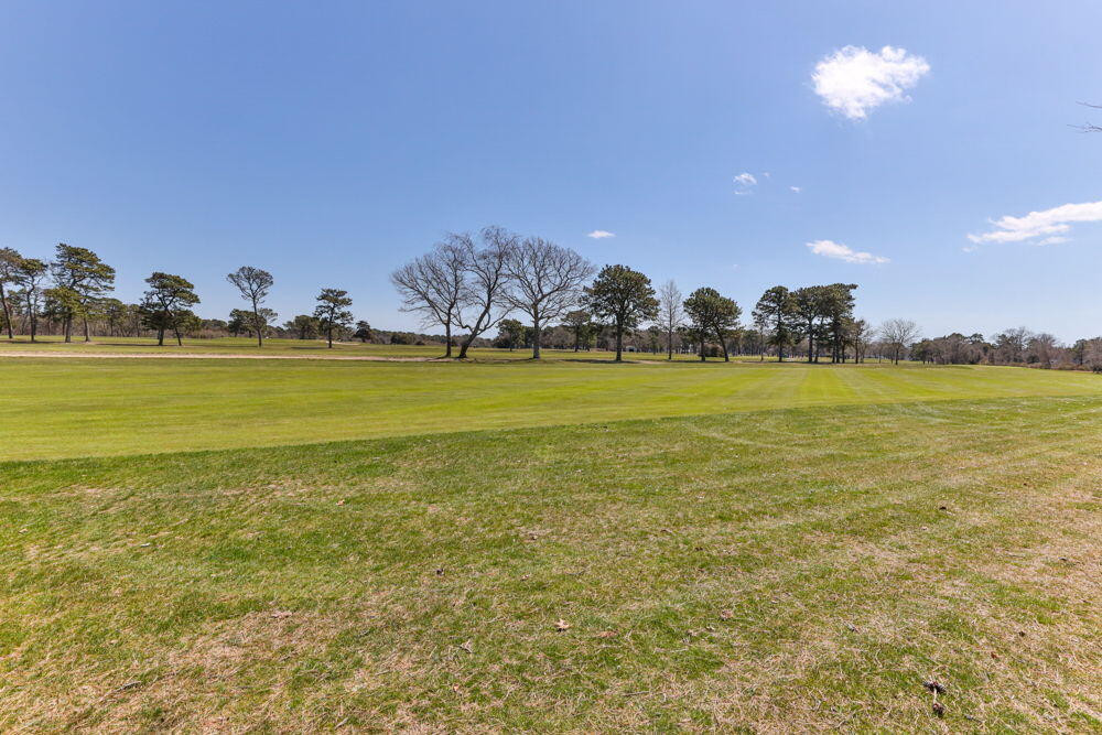 21 Green Way South Yarmouth, MA 02664 - Photo 40 of 42 a view of a lake and a yard