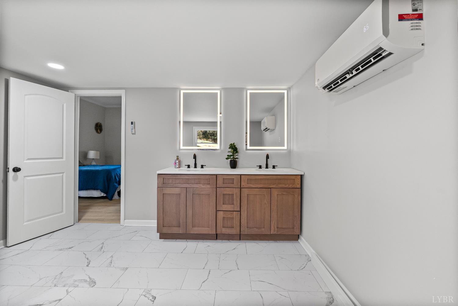 1612 South Amherst Highway Amherst, VA 24521 - Photo 9 of 48 a large white room with mirror and sink