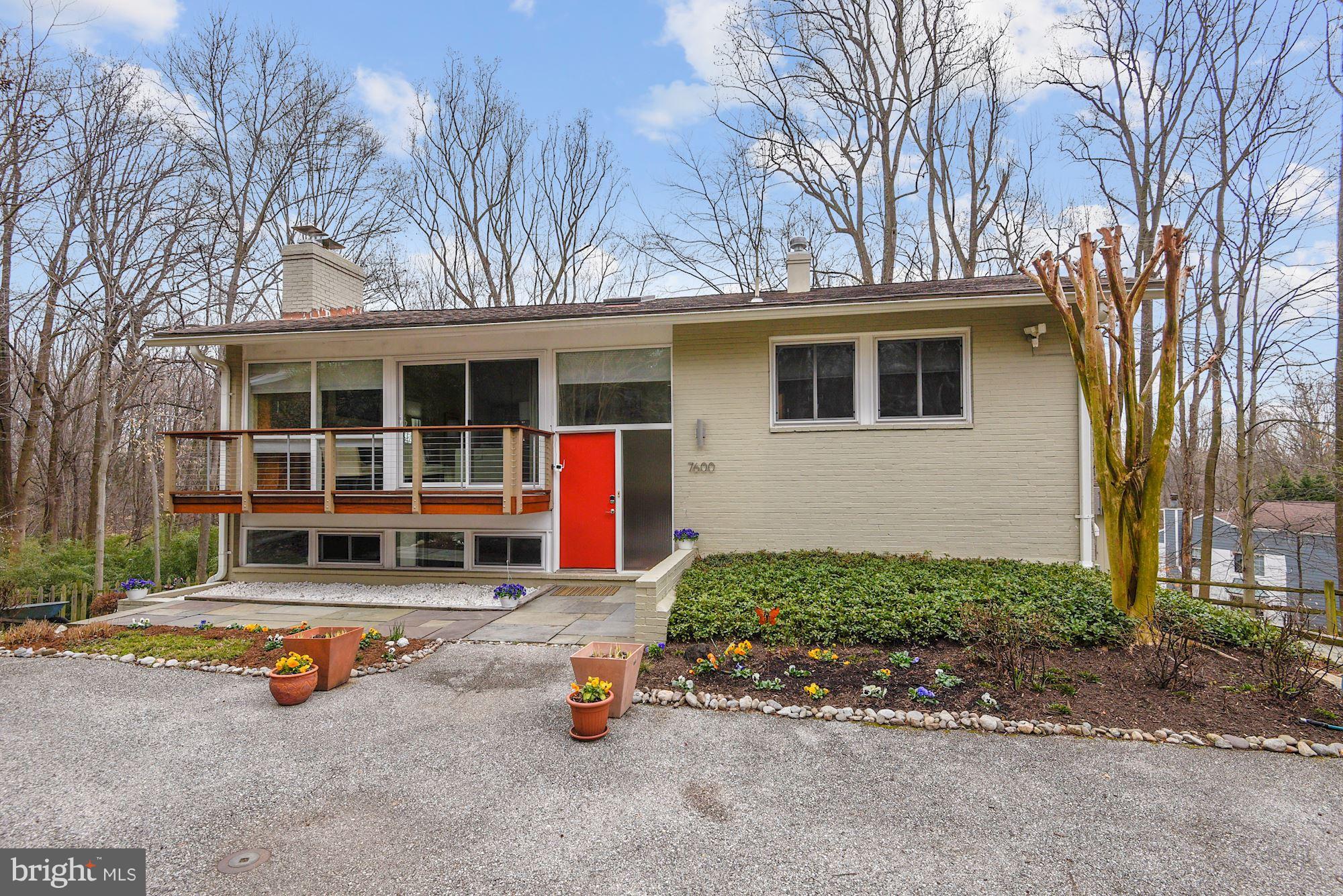 7600 Hamilton Spring Road Bethesda, MD 20817 - Photo 2 of 24 a view of a house with pool and sitting area