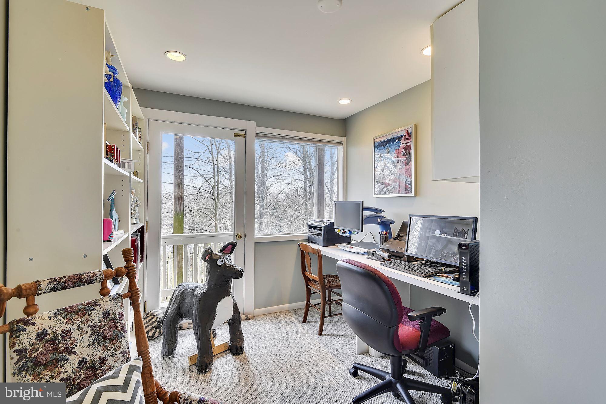 7600 Hamilton Spring Road Bethesda, MD 20817 - Photo 13 of 24 a workspace with furniture and a large window