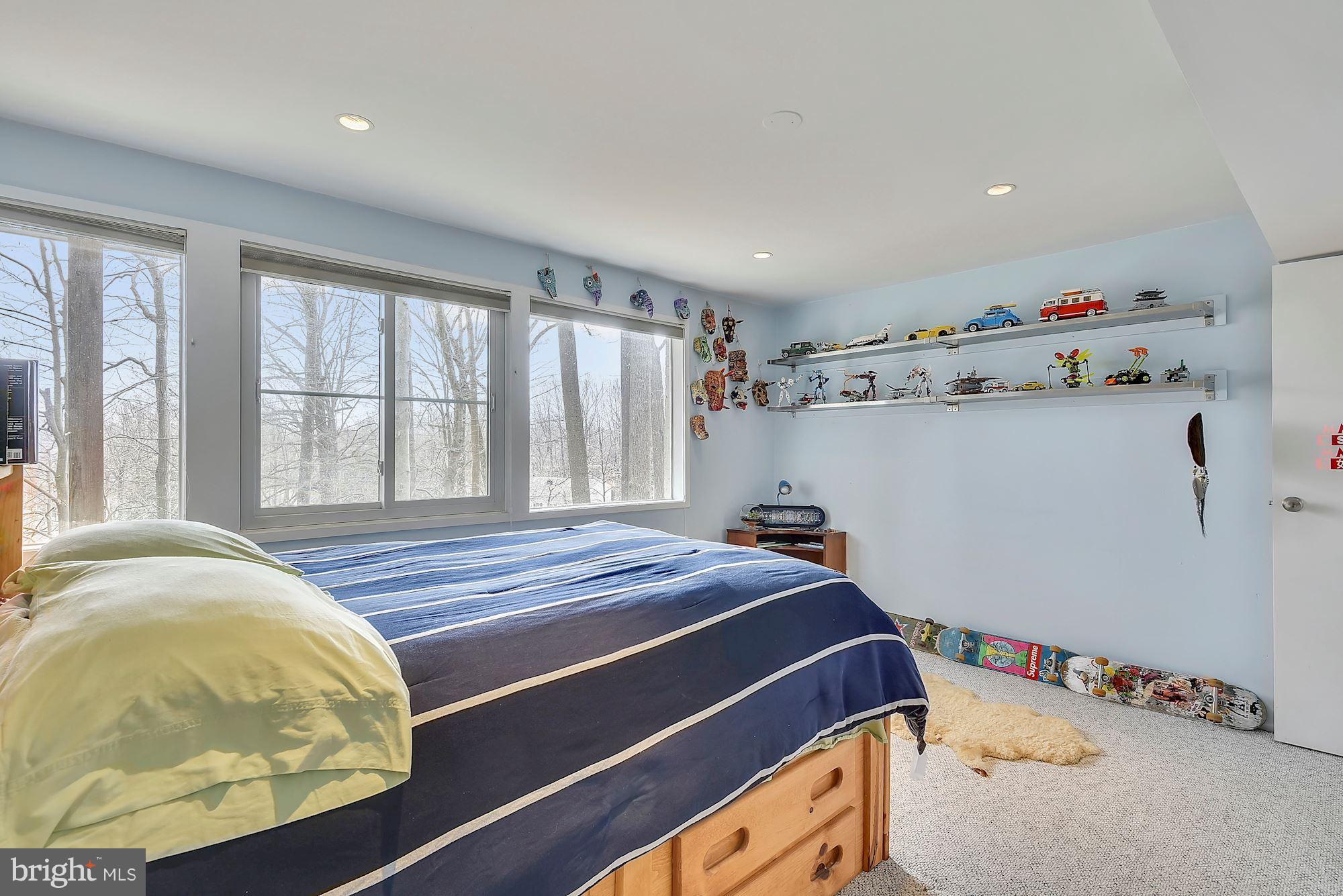 7600 Hamilton Spring Road Bethesda, MD 20817 - Photo 18 of 24 a bedroom with a bed and a window