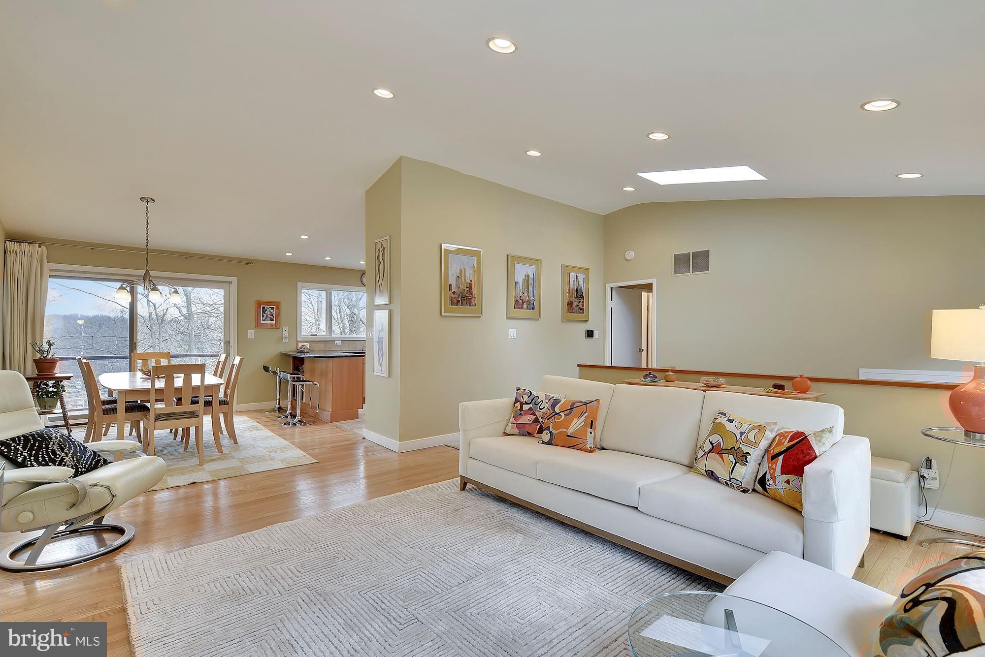 7600 Hamilton Spring Road Bethesda, MD 20817 - Photo 4 of 24 a living room with furniture and a large window