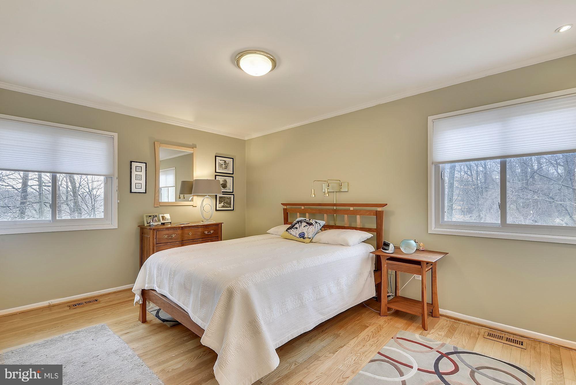 7600 Hamilton Spring Road Bethesda, MD 20817 - Photo 10 of 24 a bedroom with a bed and window