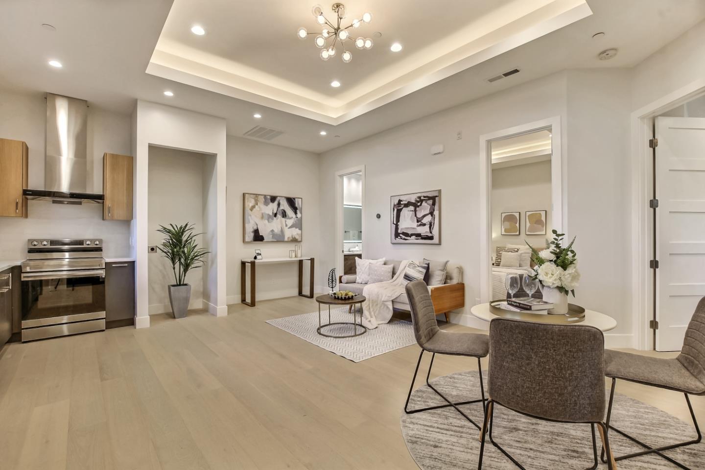 10047 Crescent Road Cupertino, CA 95014 - Photo 11 of 43 a living room with furniture and a chandelier