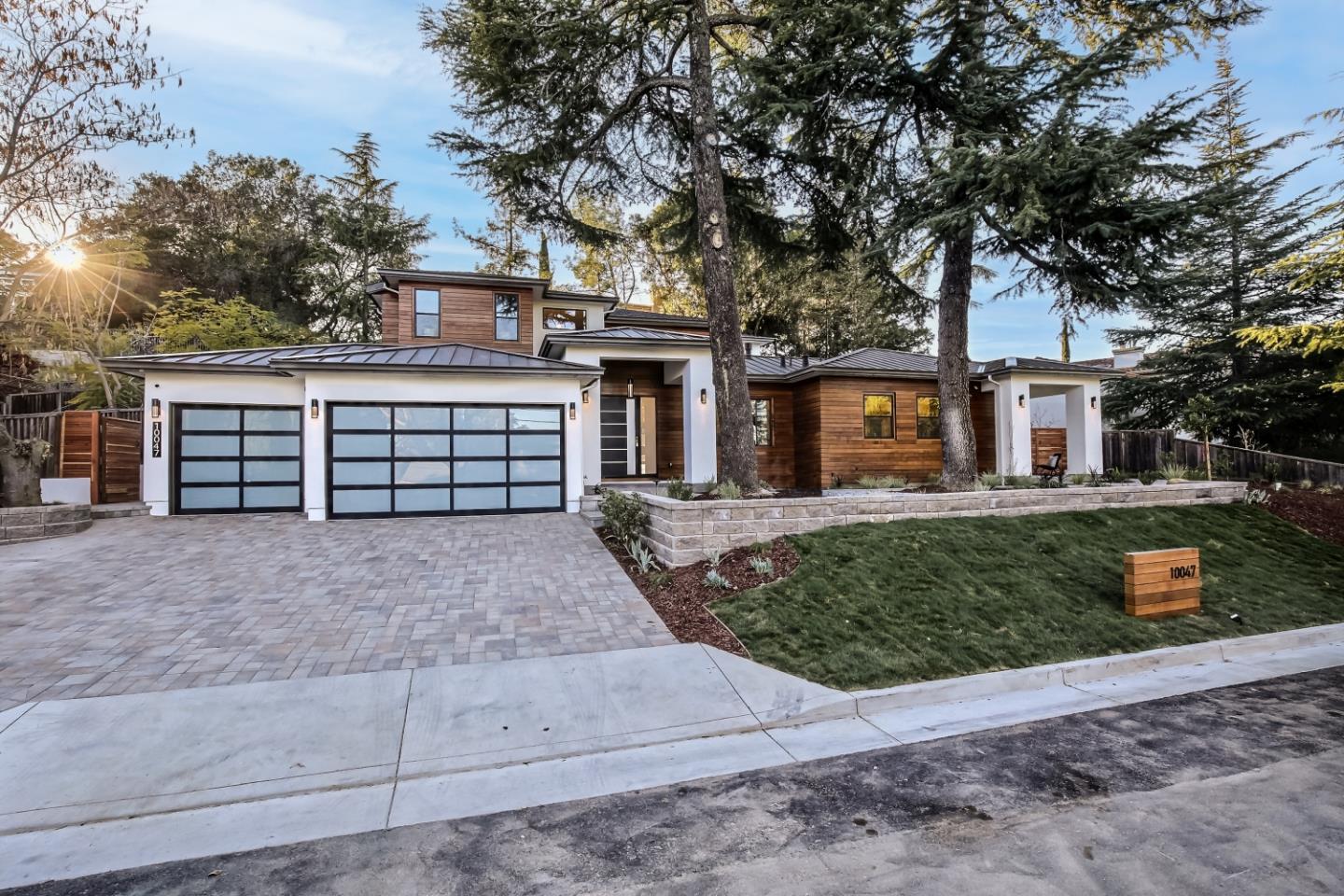 10047 Crescent Road Cupertino, CA 95014 - Photo 2 of 43 front view of a house with a yard