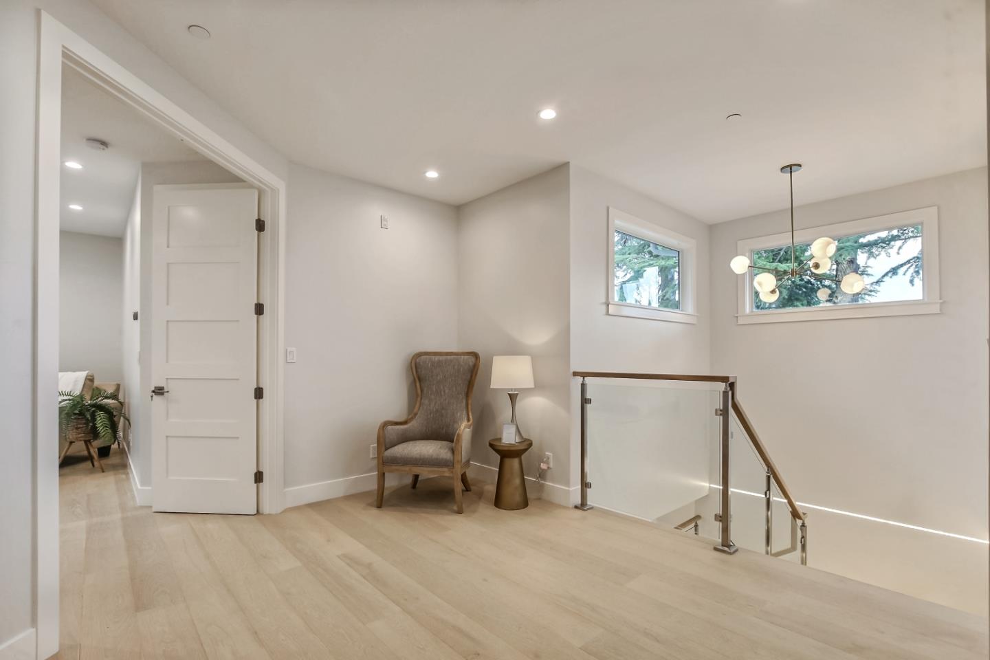10047 Crescent Road Cupertino, CA 95014 - Photo 23 of 43 a view of a livingroom with furniture and a chandelier