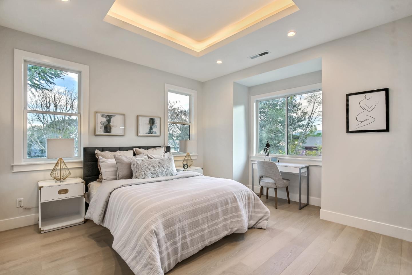 10047 Crescent Road Cupertino, CA 95014 - Photo 26 of 43 a bedroom with a bed and a large window