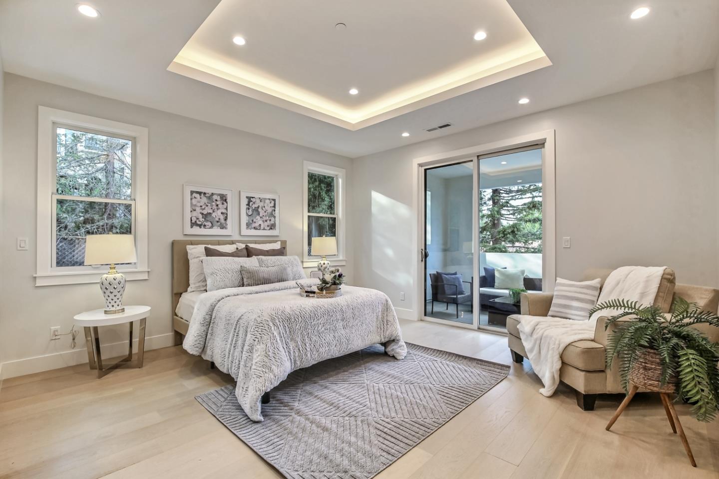 10047 Crescent Road Cupertino, CA 95014 - Photo 28 of 43 a bedroom with a large bed and windows