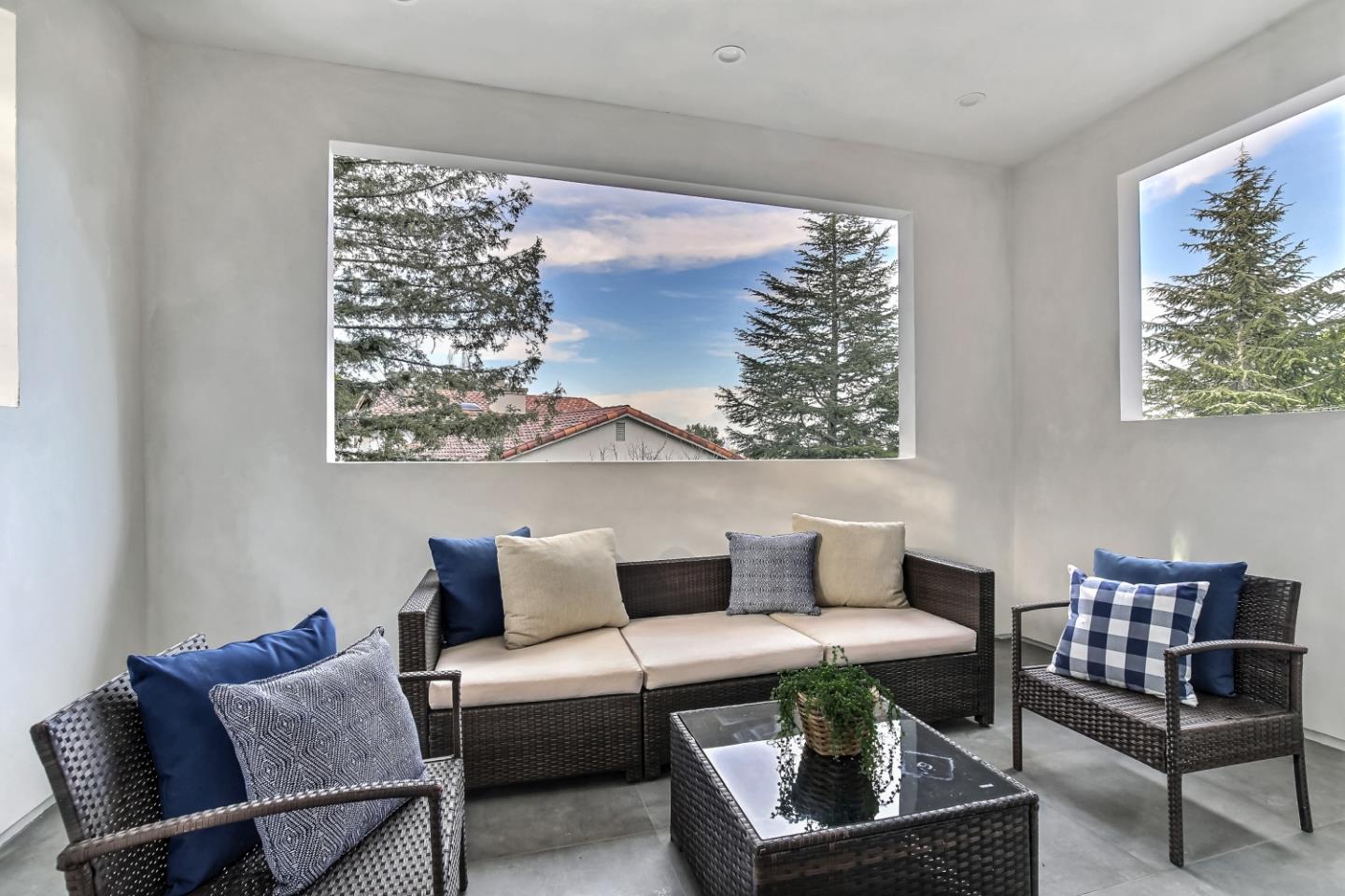 10047 Crescent Road Cupertino, CA 95014 - Photo 30 of 43 a living room with furniture and a large window