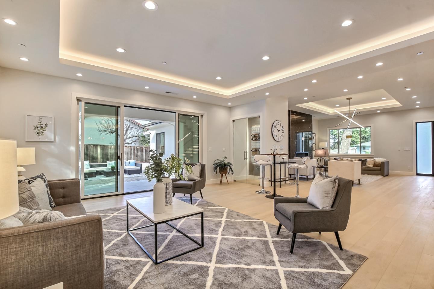 10047 Crescent Road Cupertino, CA 95014 - Photo 8 of 43 a living room with furniture and a table