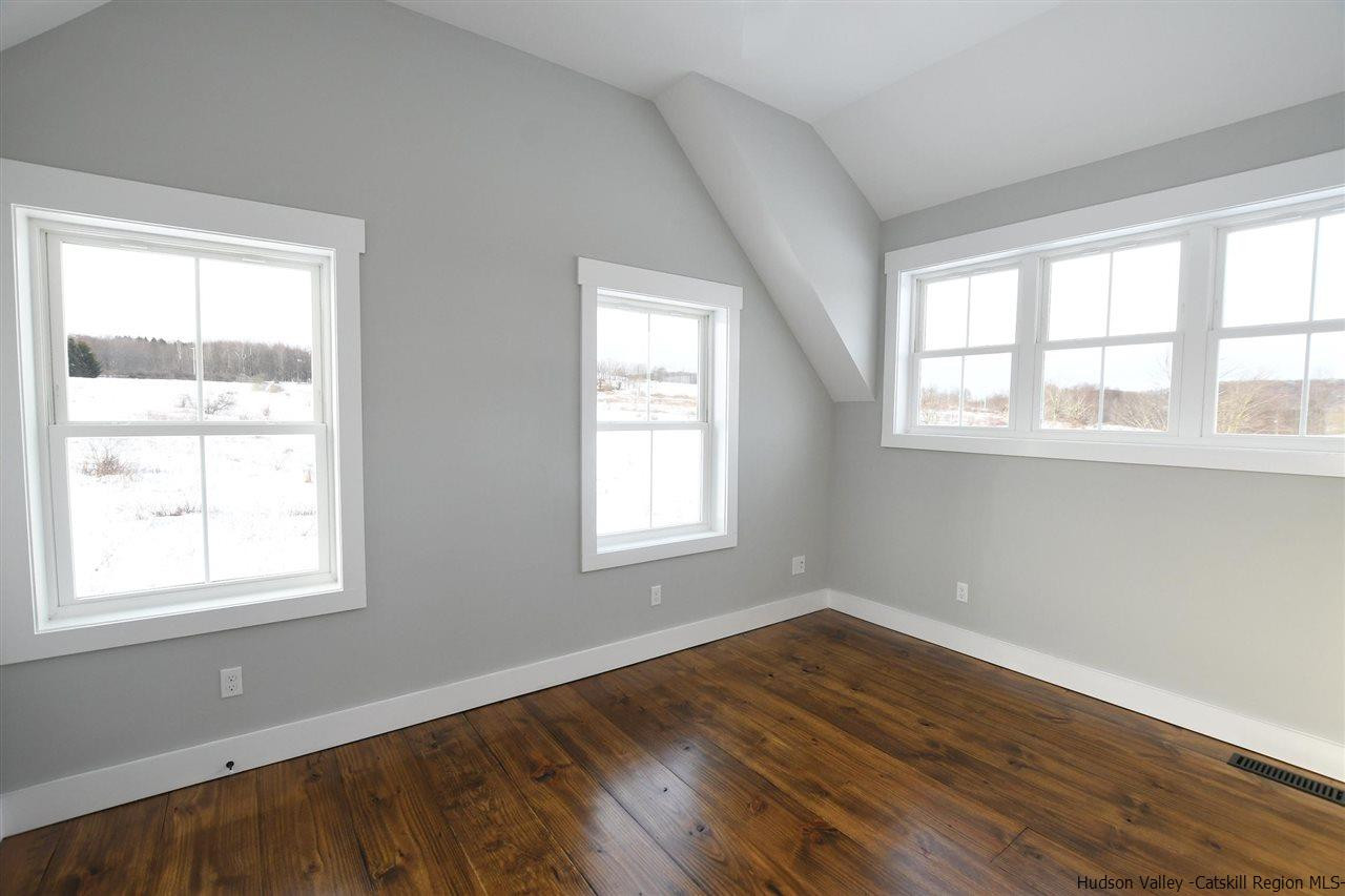 460 County Road Callicoon, NY 12723 - Photo 20 of 33 a view of an empty room with wooden floor and a window