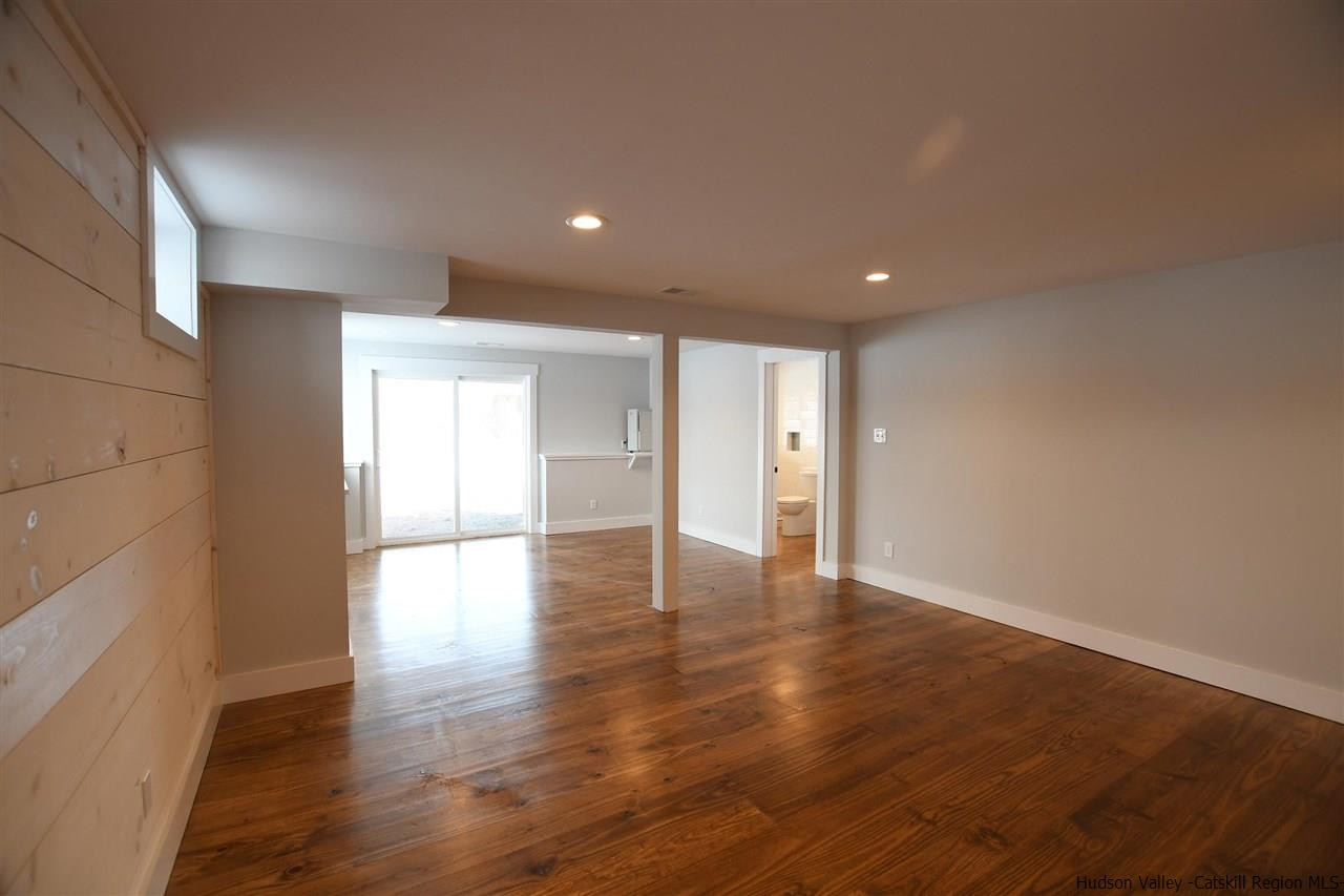 460 County Road Callicoon, NY 12723 - Photo 26 of 33 a view of an empty room with wooden floor and a window