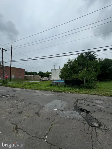 a view of a garden with a building