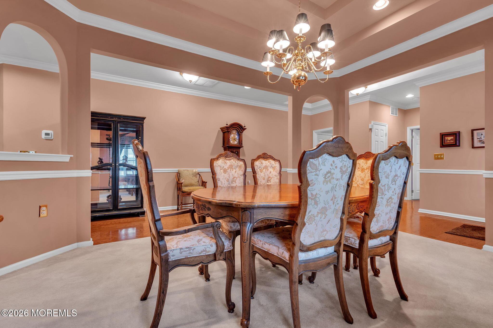 46 Pancoast Road Waretown, NJ 08758 - Photo 11 of 55 a view of a dining room with furniture and chandelier