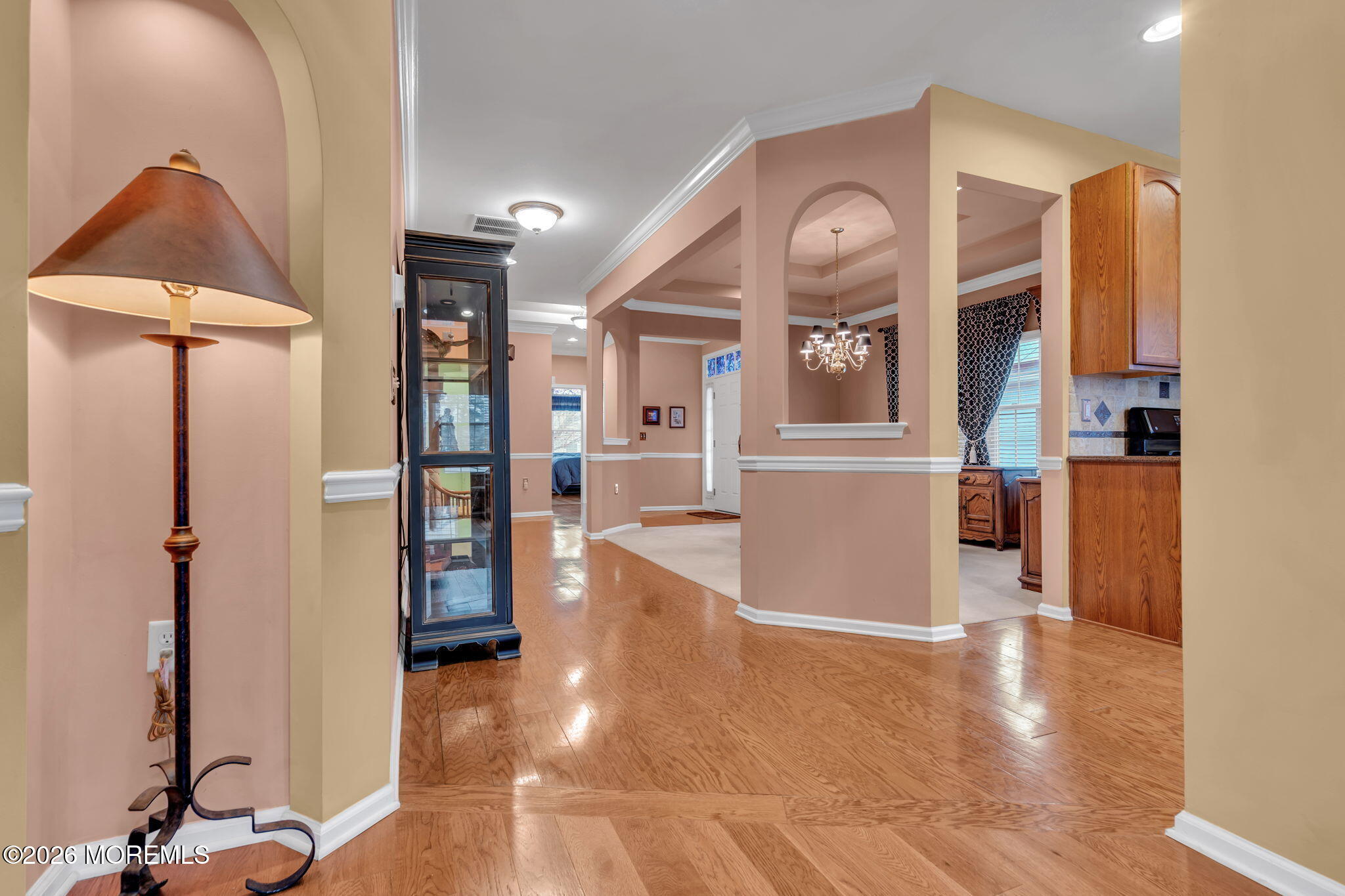 46 Pancoast Road Waretown, NJ 08758 - Photo 12 of 55 a view of a hallway with entryway and wooden floor