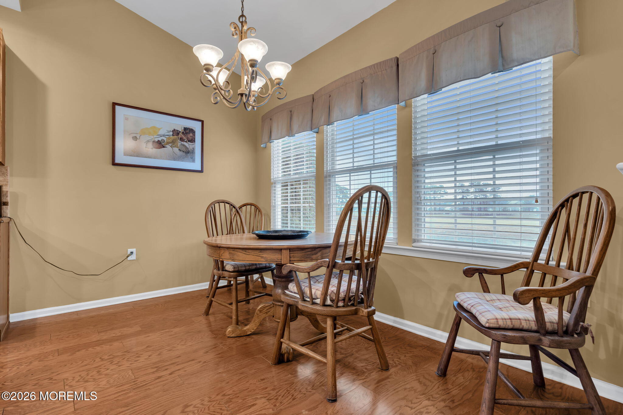 46 Pancoast Road Waretown, NJ 08758 - Photo 17 of 55 a view of a dining room with furniture and chandelier