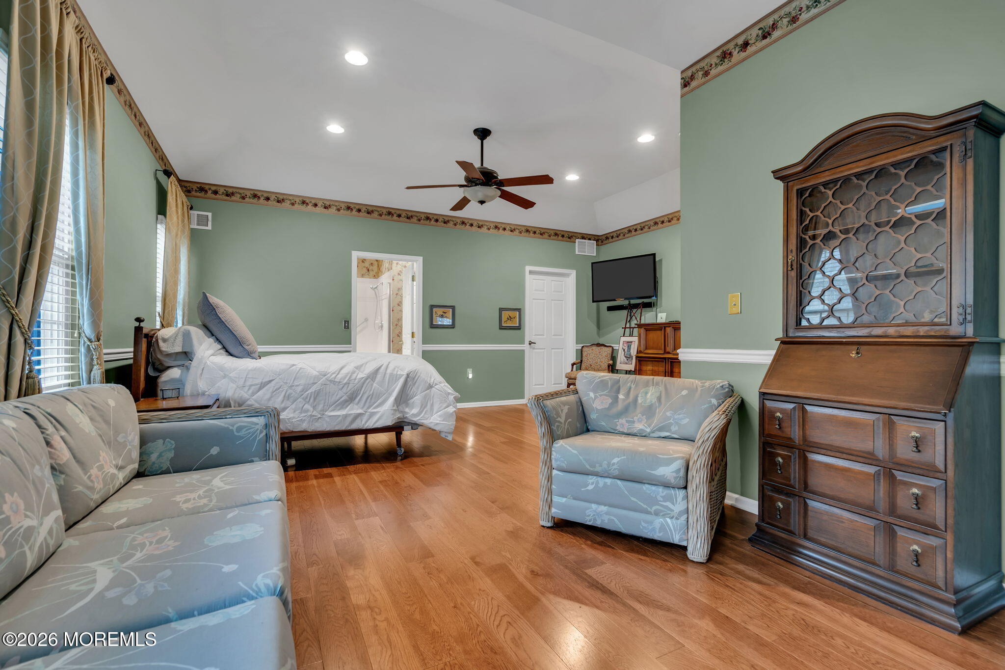 46 Pancoast Road Waretown, NJ 08758 - Photo 24 of 55 a living room with furniture and a chandelier