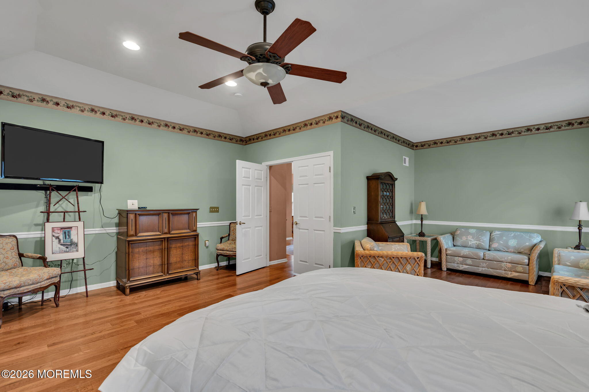 46 Pancoast Road Waretown, NJ 08758 - Photo 25 of 55 a bedroom with furniture and a flat screen tv