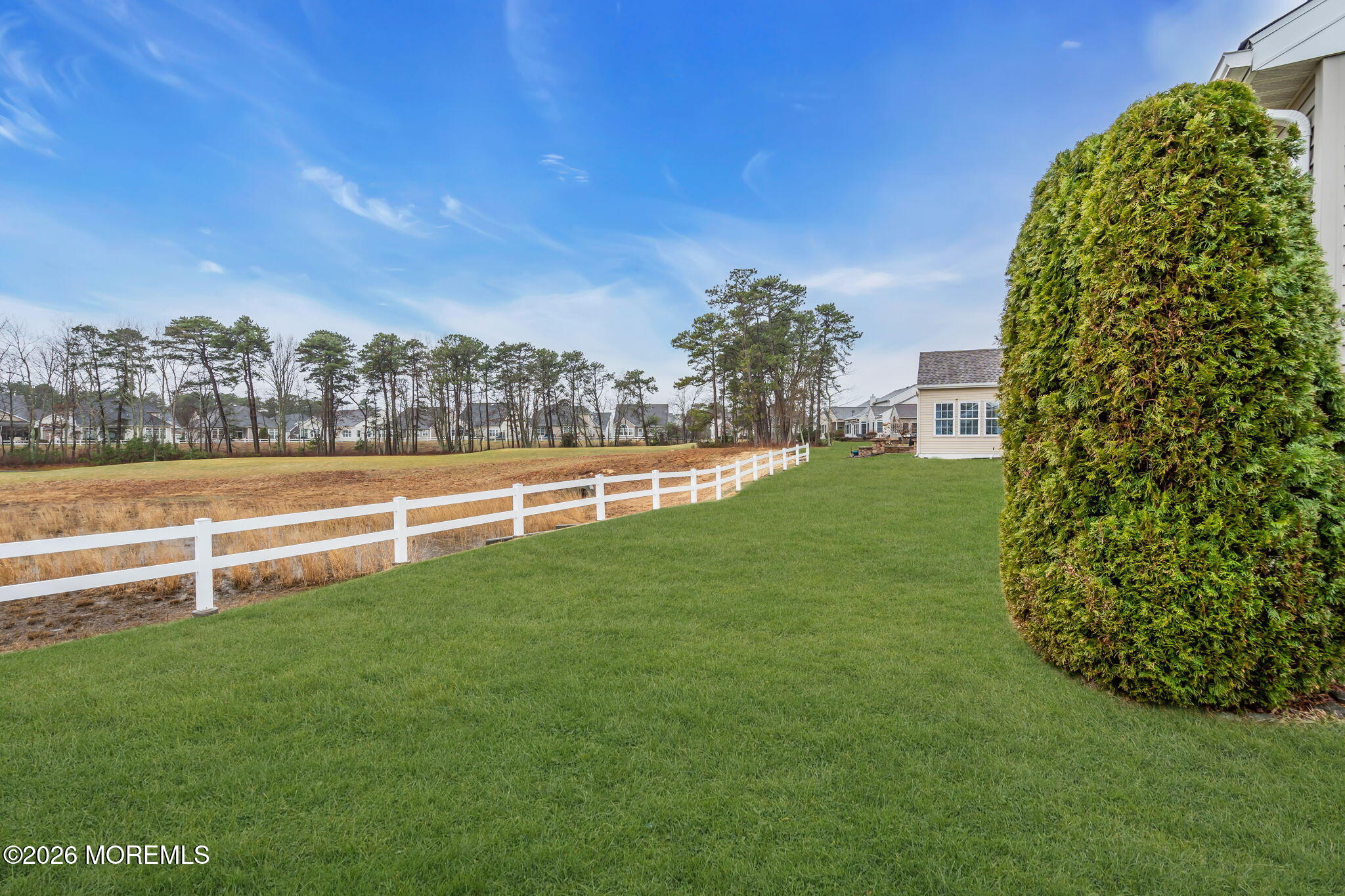 46 Pancoast Road Waretown, NJ 08758 - Photo 35 of 55 a view of a green field with clear sky