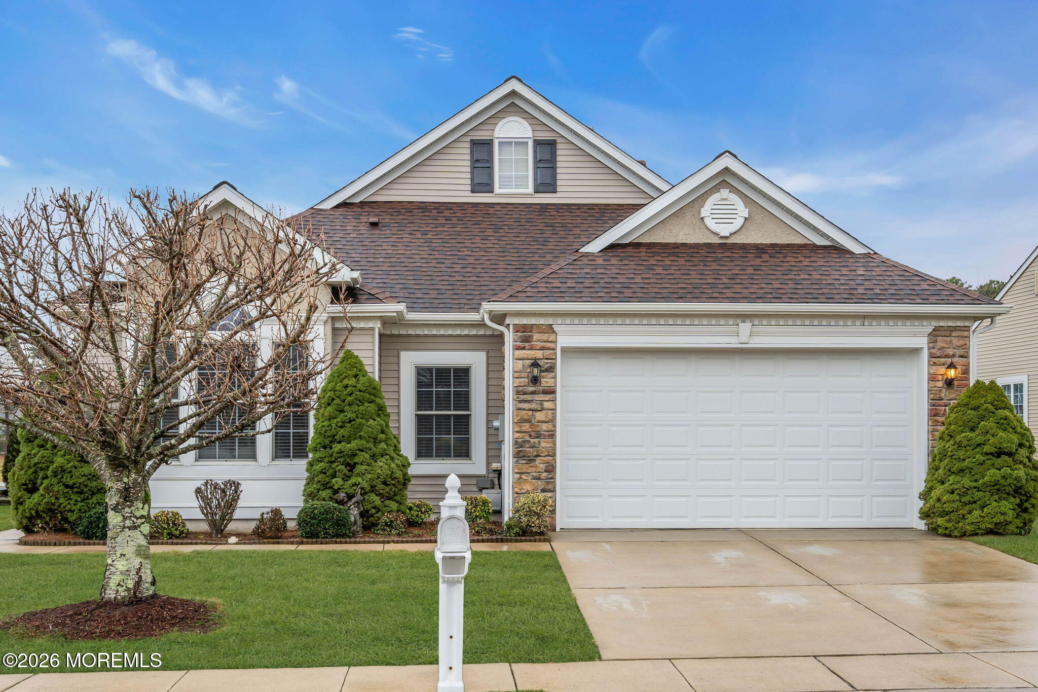 46 Pancoast Road Waretown, NJ 08758 - Photo 4 of 55 a front view of a house with a yard and trees