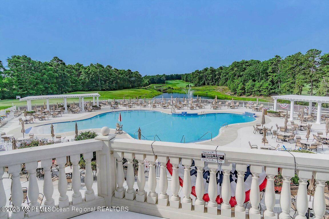 46 Pancoast Road Waretown, NJ 08758 - Photo 53 of 55 a view of a chairs and table in the balcony