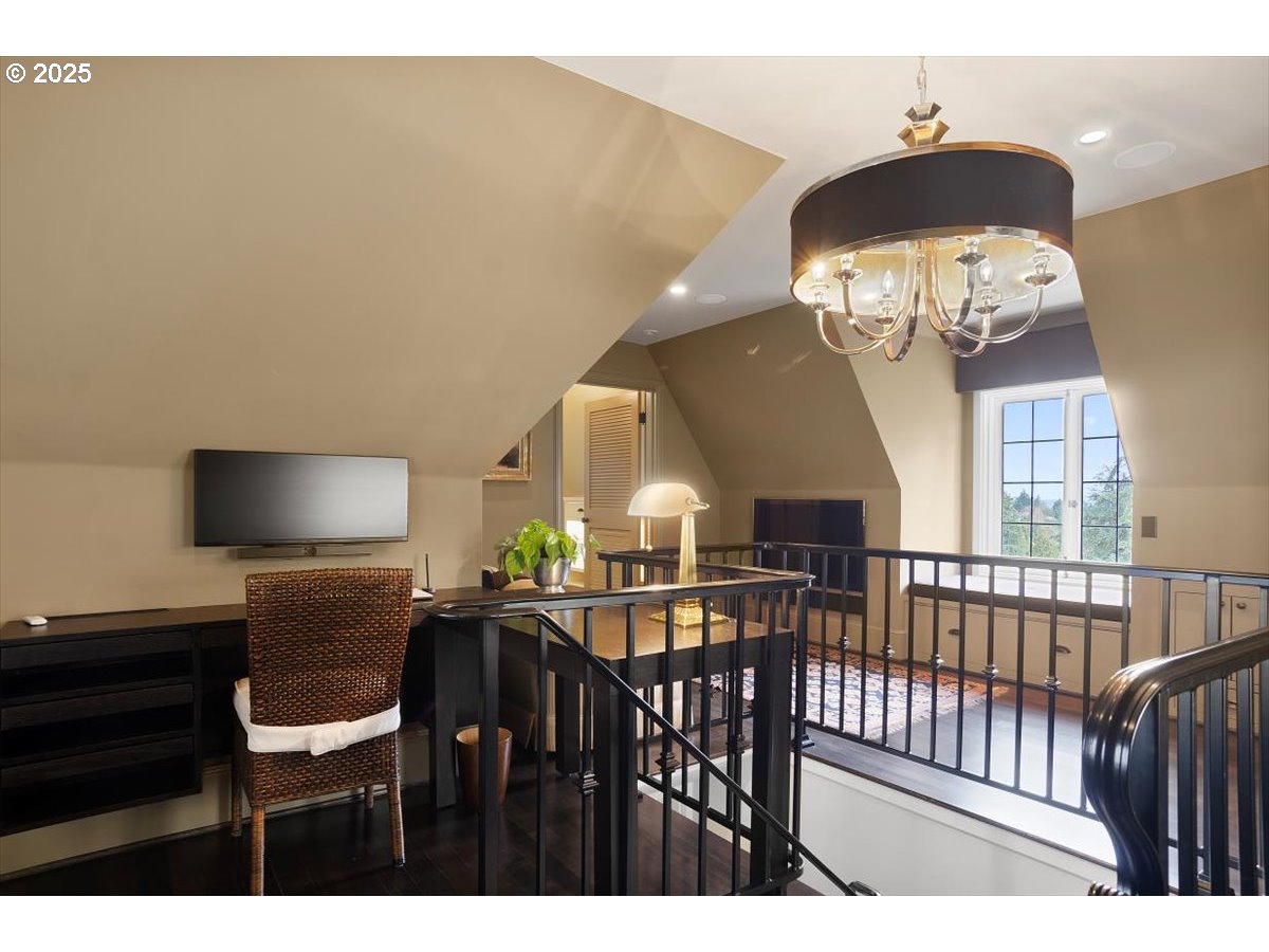 2624 Southwest Talbot Road Portland, OR 97201 - Photo 33 of 48 a view of a dining room with furniture and chandelier