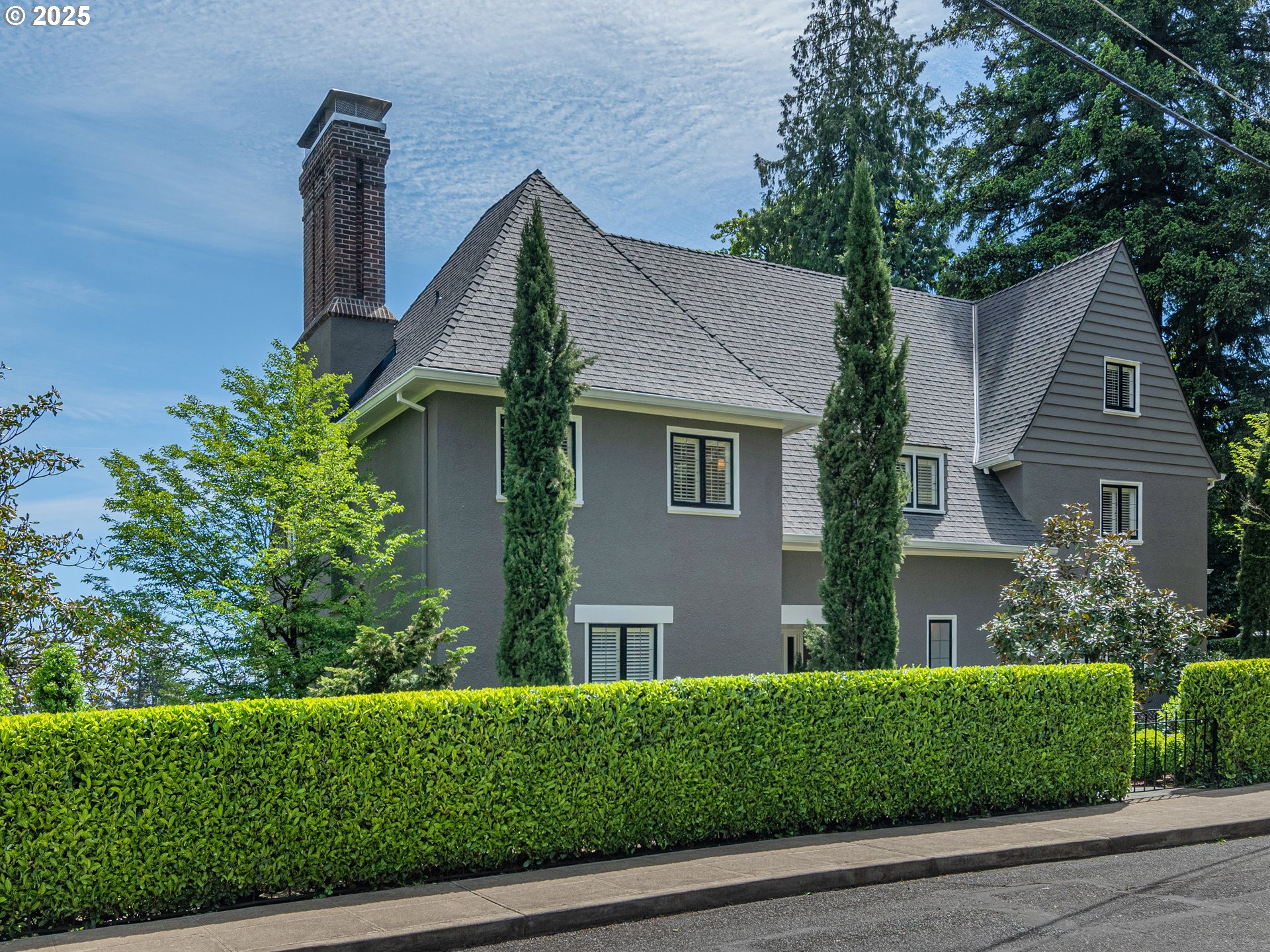 2624 Southwest Talbot Road Portland, OR 97201 - Photo 36 of 48 a front view of a house with a yard