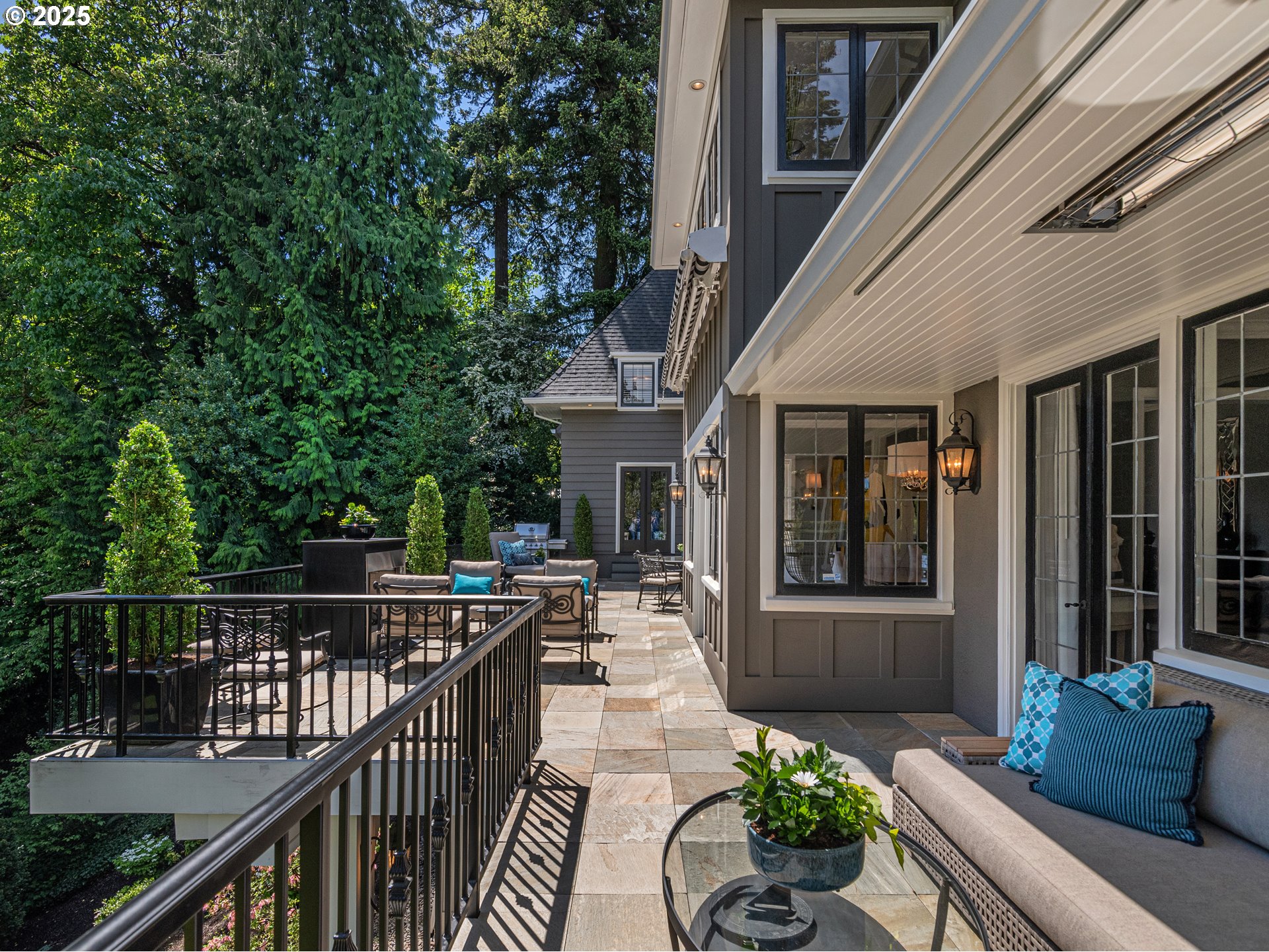 2624 Southwest Talbot Road Portland, OR 97201 - Photo 42 of 48 a view of a patio with couches table and chairs and potted plants