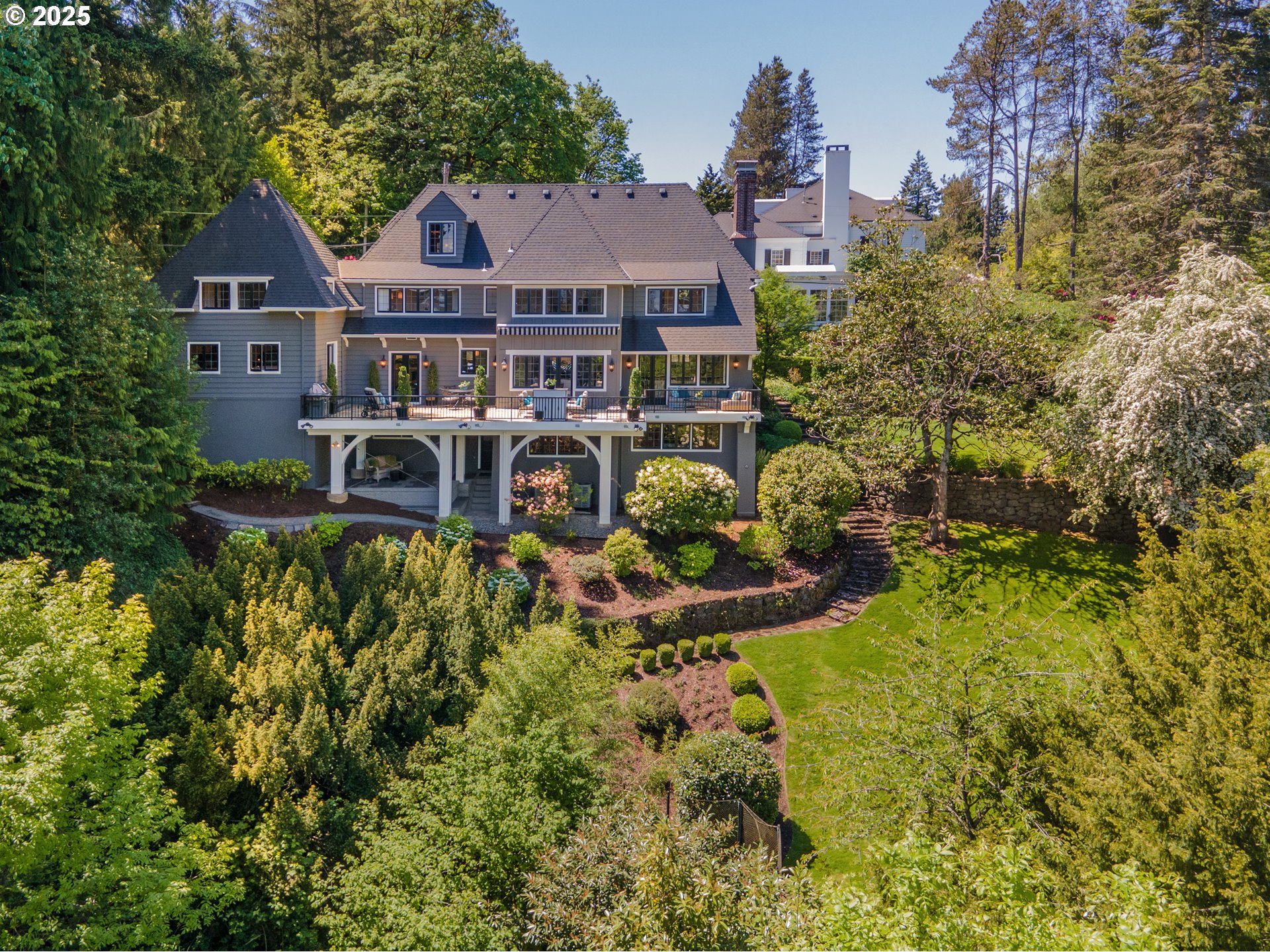 2624 Southwest Talbot Road Portland, OR 97201 - Photo 47 of 48 a aerial view of a house with swimming pool and garden