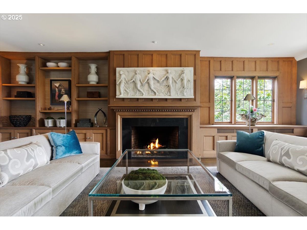 2624 Southwest Talbot Road Portland, OR 97201 - Photo 6 of 48 a living room with furniture and a fireplace