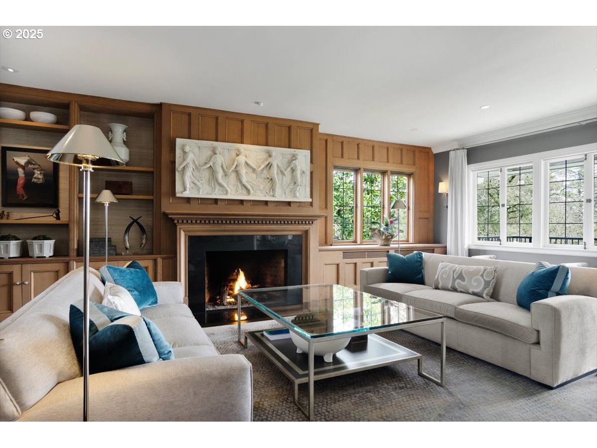 2624 Southwest Talbot Road Portland, OR 97201 - Photo 7 of 48 a living room with furniture and a fireplace
