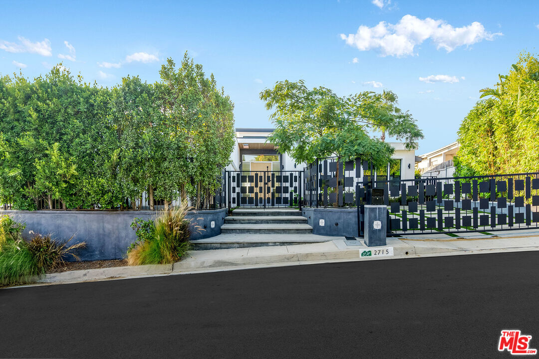 2715 Edwin Place Los Angeles, CA 90046 - Photo 2 of 52 a house view with a garden space